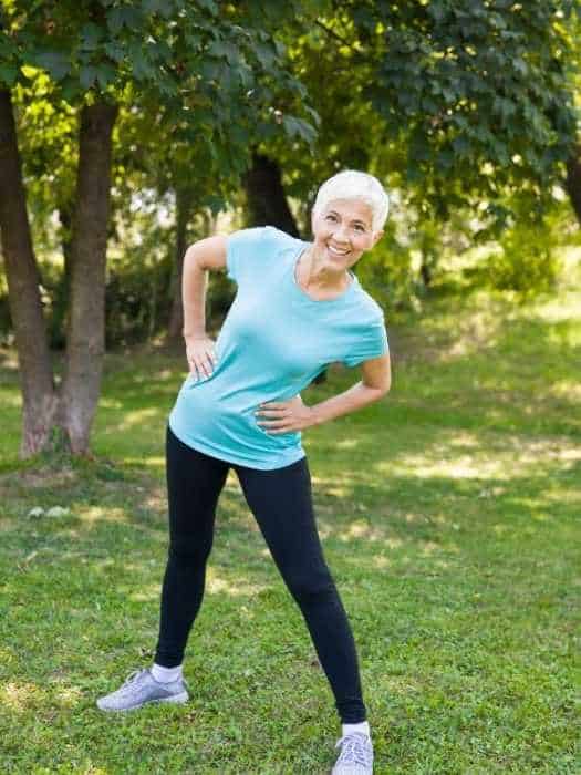 older woman doing stretches